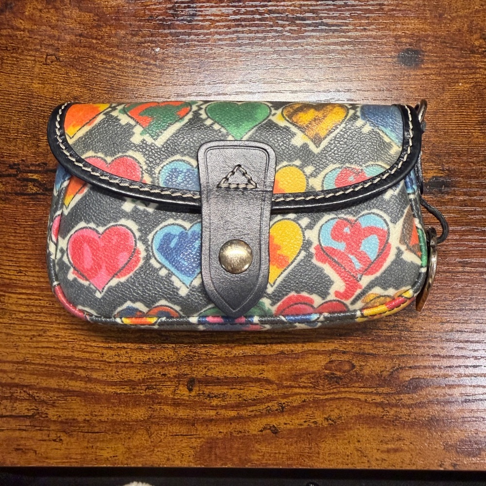 Dooney and Bourke oncour twist flap leather in heart pattern